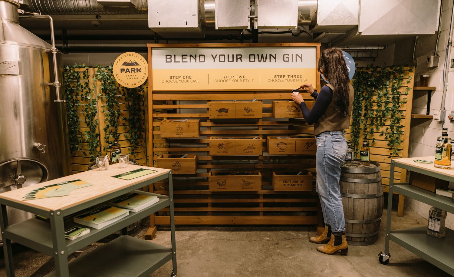A woman tries the Blend your Own Gin experience at PARK Distillery in Banff National Park.